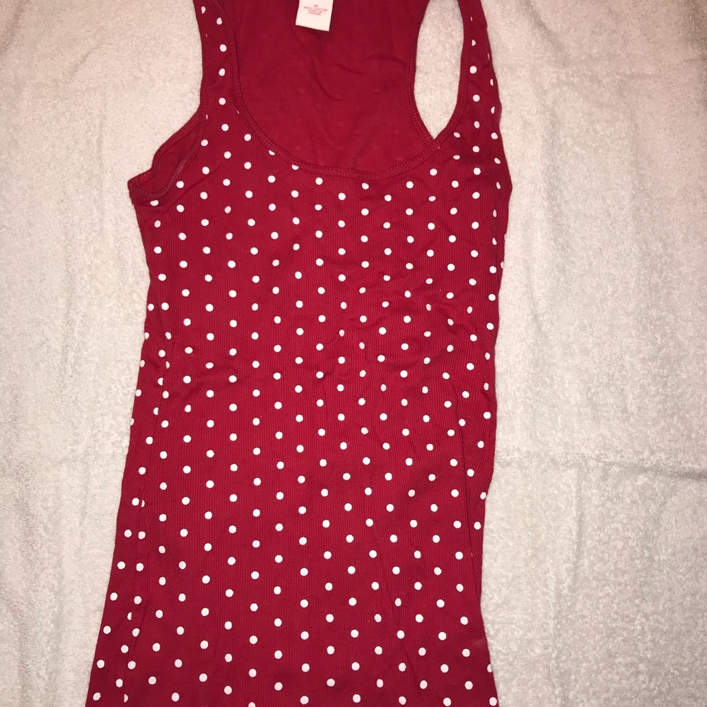 Red with white dots tank